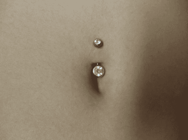 Dermal belly button on sale piercing